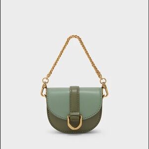 Charles & Keith Micro Gabine Two-tone Saddle Bag in Olive Green Color Block
